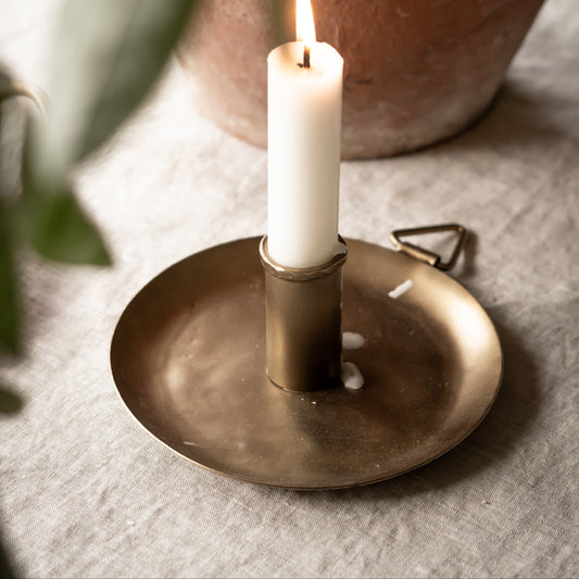 Antique brass bow candle holder with white taper candles
Vintage style brass candle holder gift set in linen bag
Iron candle holder with bow detail and slender white candles
Antique brass candle holder for mantel and table styling
Decorative brass candle holder with rustic patina finish
Classic bow candle holder with six white candles
Elegant antique brass candle holder for home decor
Small brass candle holder styled on a shelf or dining table