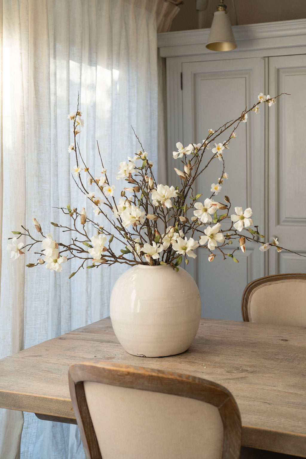 Open Magnolia and Apple Blossom Arrangement