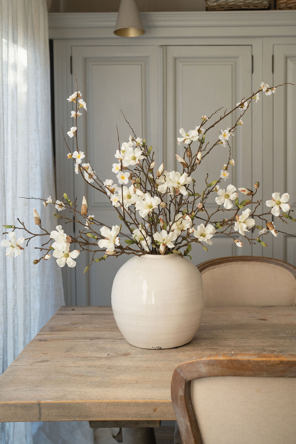 Open Magnolia and Apple Blossom Arrangement